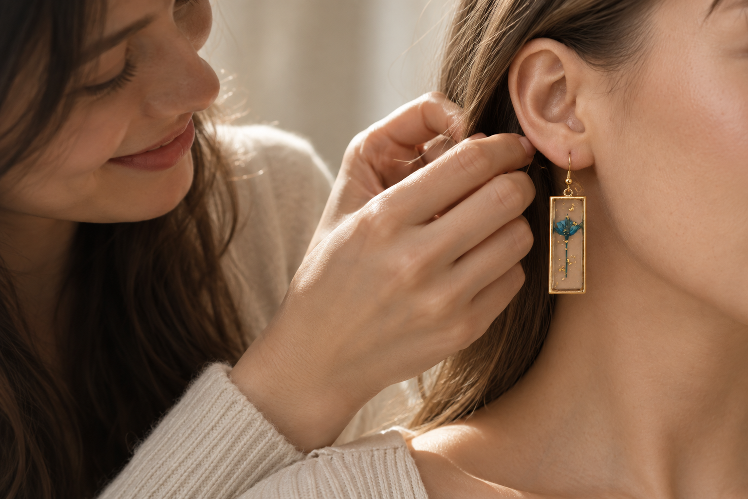 A thoughtful moment with botanical earrings