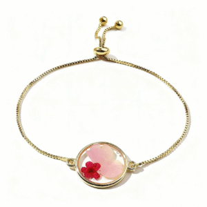 gold adjustable bracelet with pressed flower charm