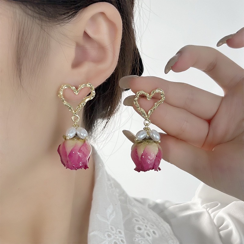 French vintage rose heart drop earrings worn on ear